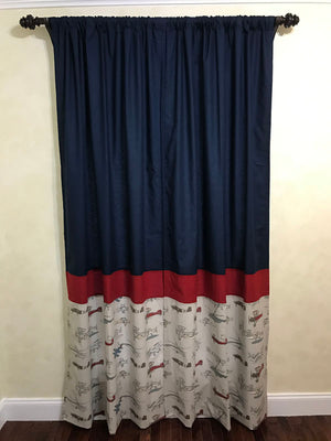 Vintage Airplane with Navy and Red Curtain Panels