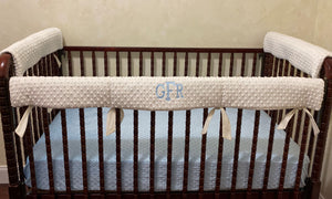 minky dot rail covers shown on crib